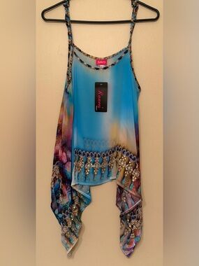 Blue chiffon top with a multi-colored print and crystal embellishments